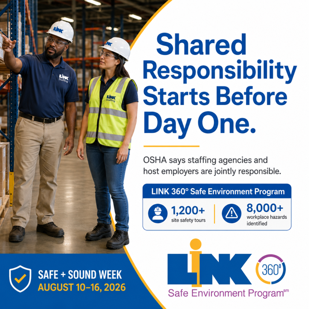 Two workplace professionals discussing safety conditions in a warehouse, illustrating shared responsibility for temporary worker safety.