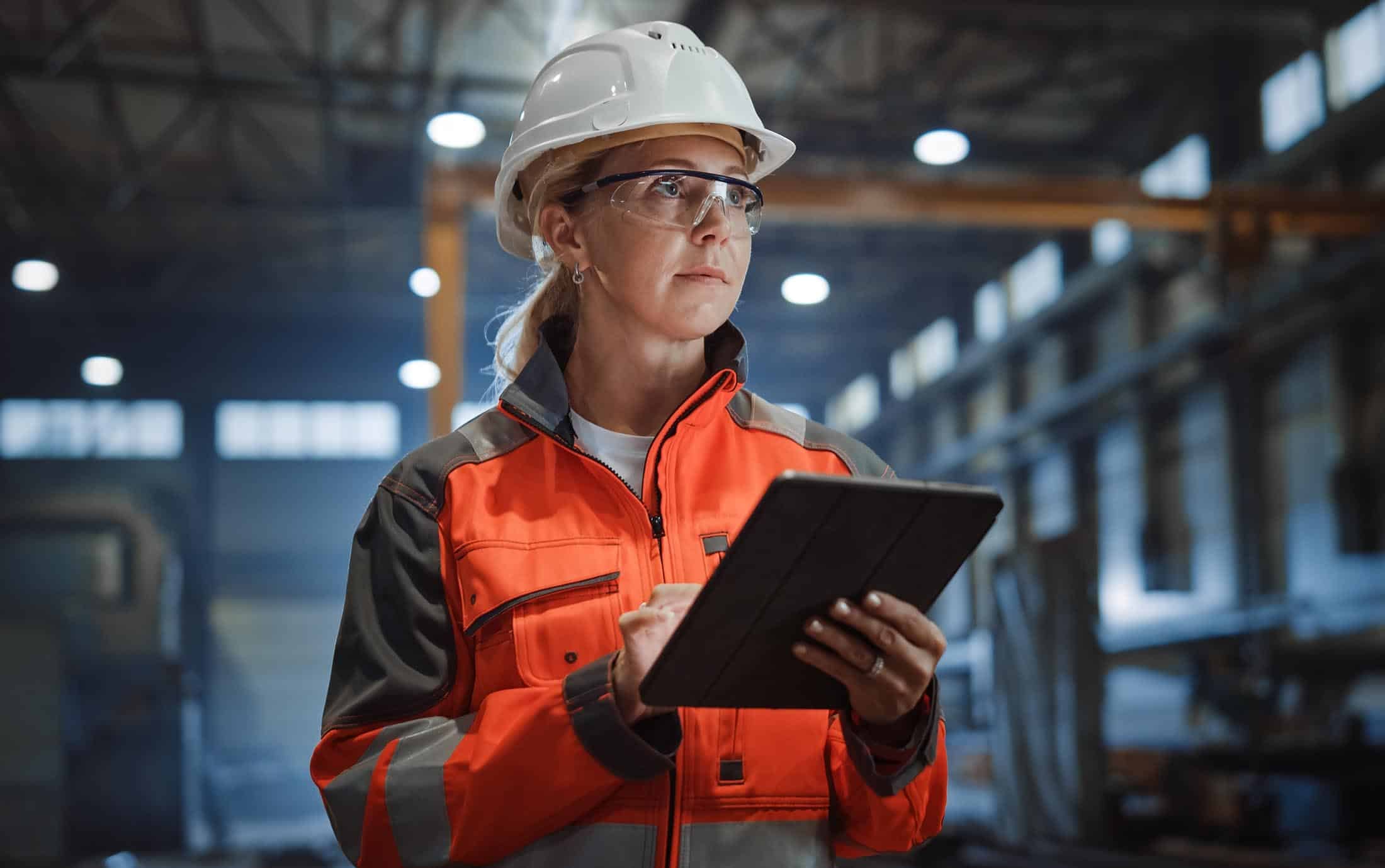 LINK Field Staff in PPE on a manufacturing floor